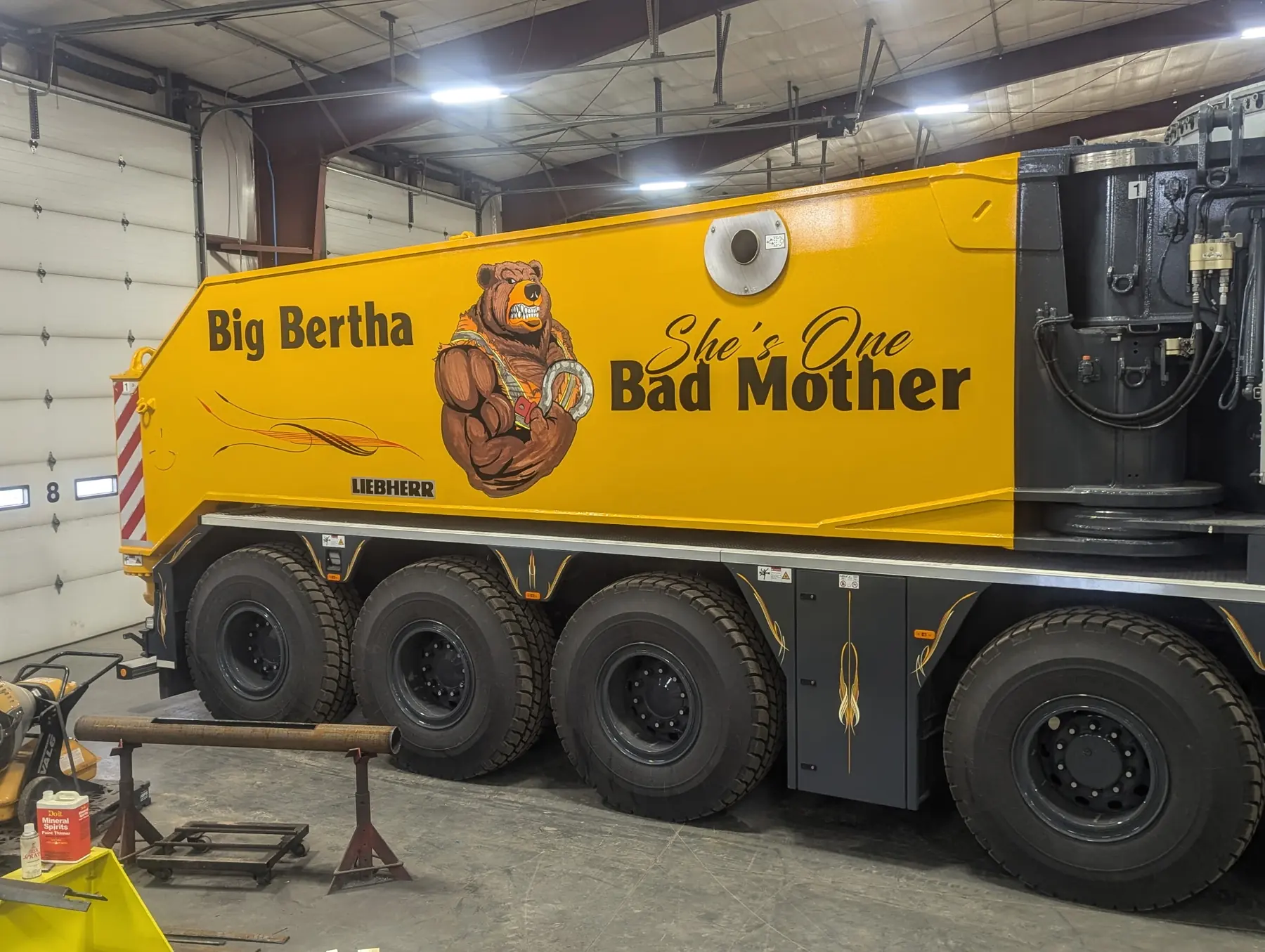 Big Bertha, the Trand Liebherr LG 1800 carrier with its bear mascot artwork