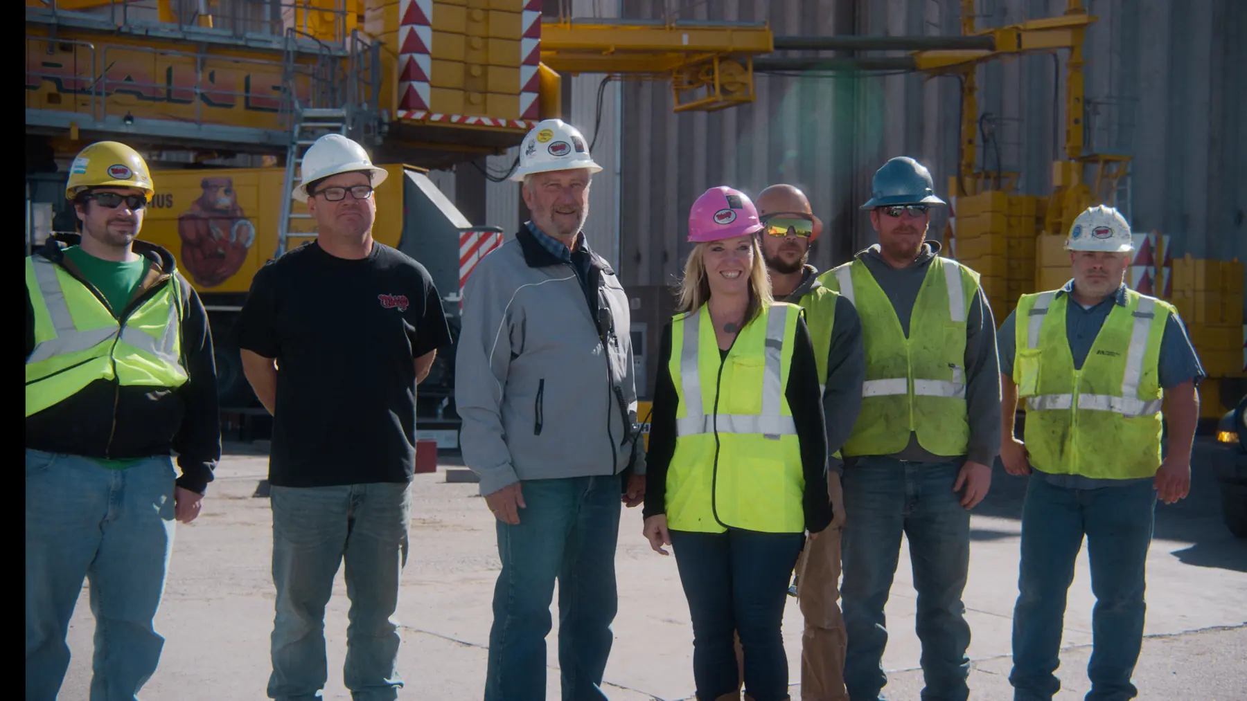 Trand crew in hard hats and safety vests