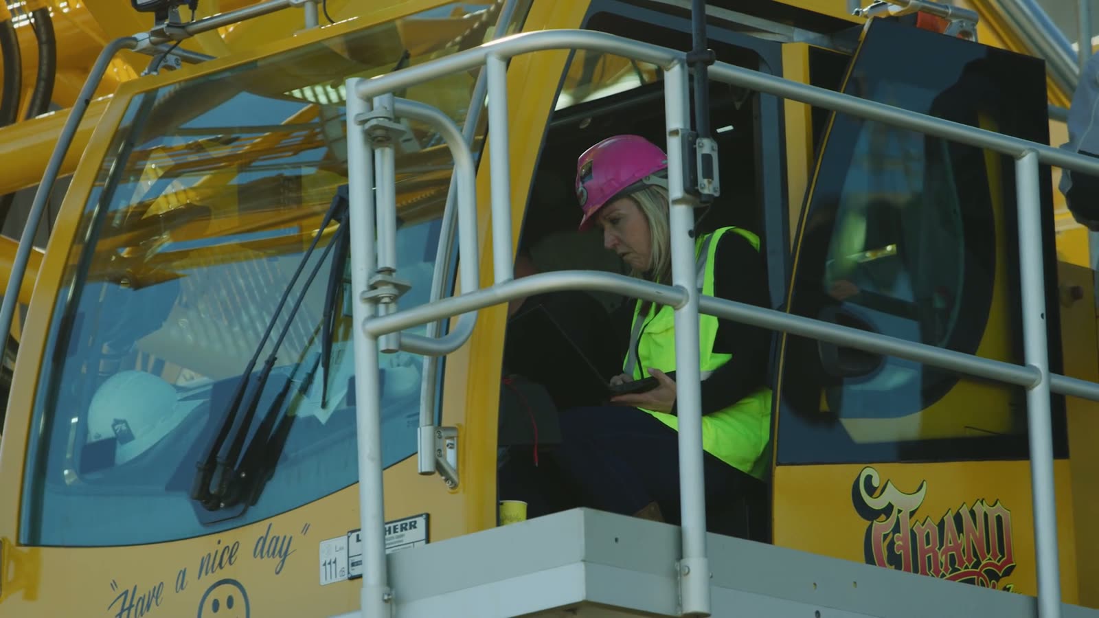 Trand operator in the cab of a Liebherr crane